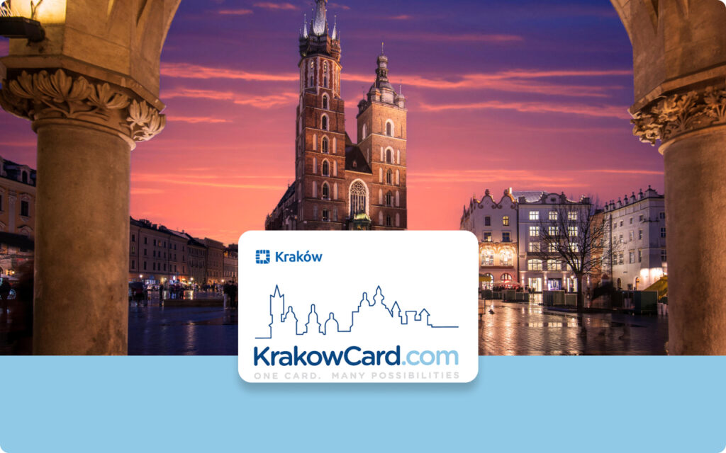 KrakowCard in front of St. Mary's Basilica at dusk. KrakowCard.com, One Card. Many Possibilities.